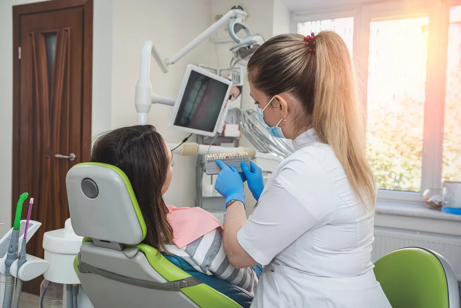 dentist explaining treatment options at lake worth family dentistry